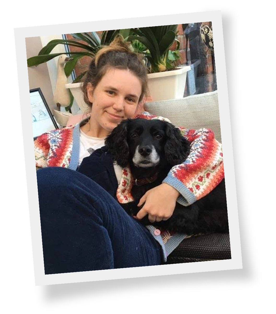 Ellen holding her dog.